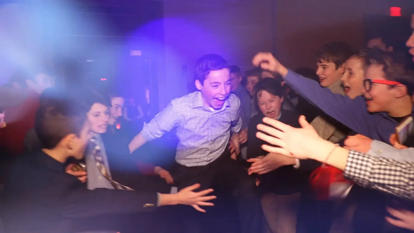 Guest of honor and friends on the dance floor at a Sky Events bar mitzvah